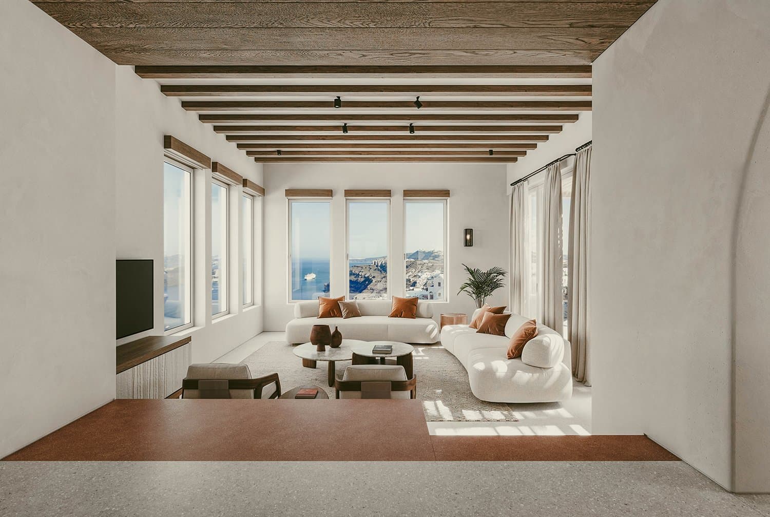 The living room is surrounded by the majestic landscape of the island