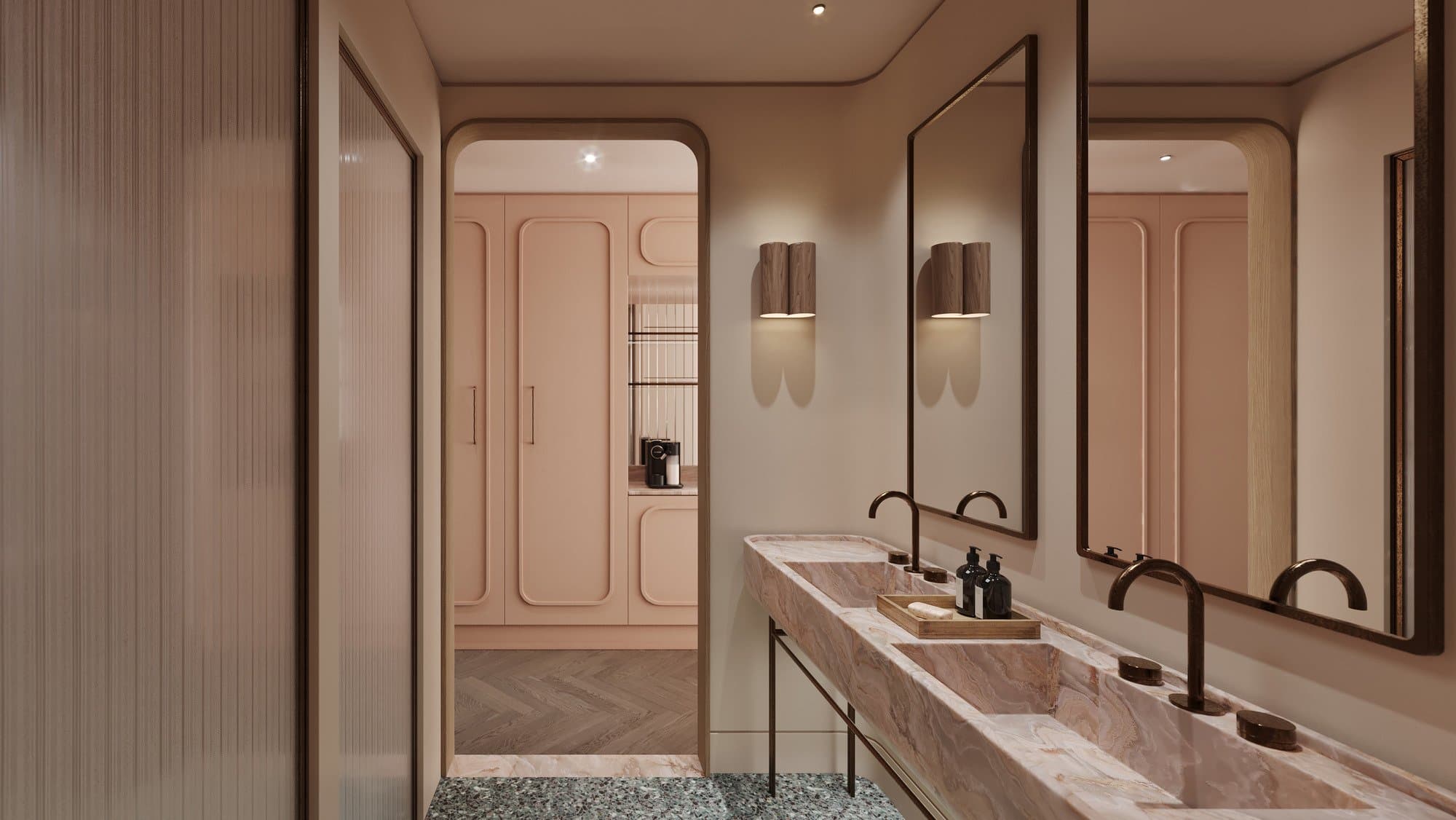 Pink onyx double vanity in the executive bathroom