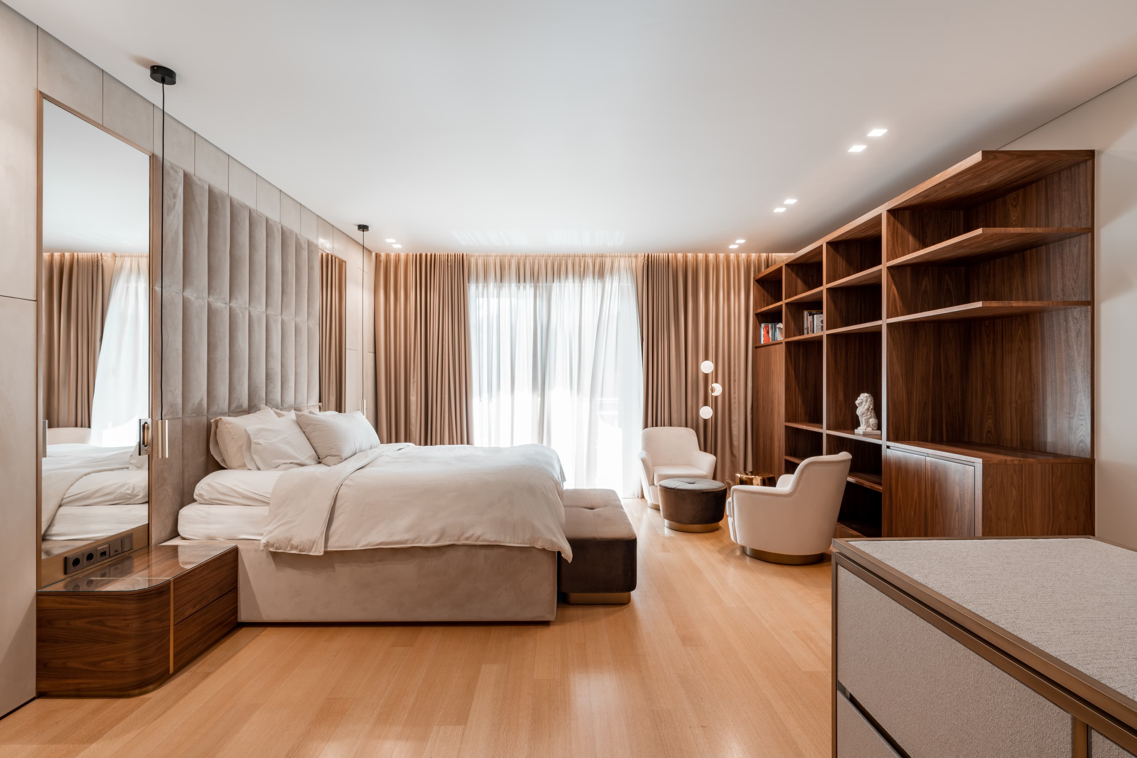 Master bedroom in tonal wood and drapery