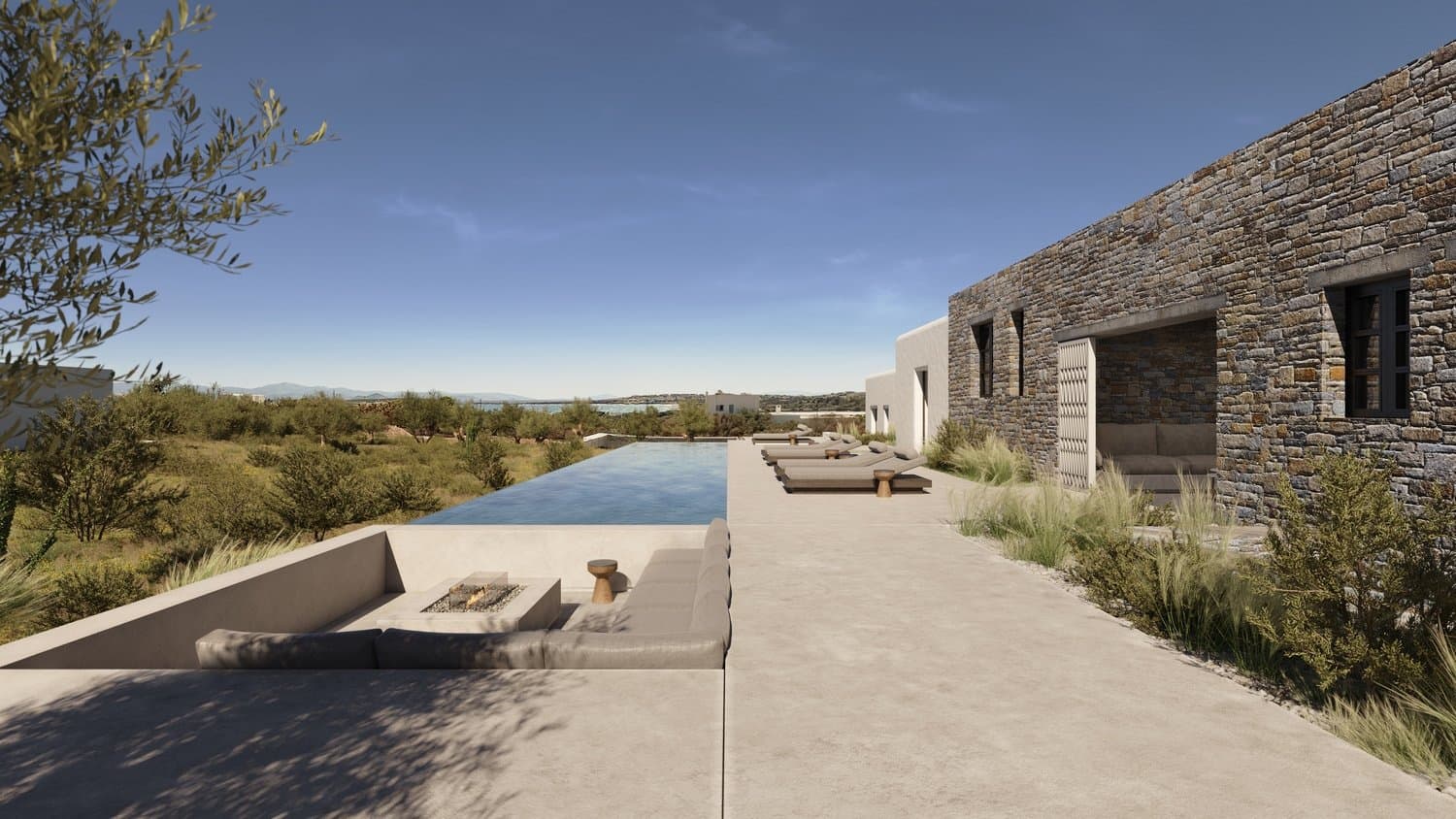 Sunken fire pit lounge beside the infinity pool