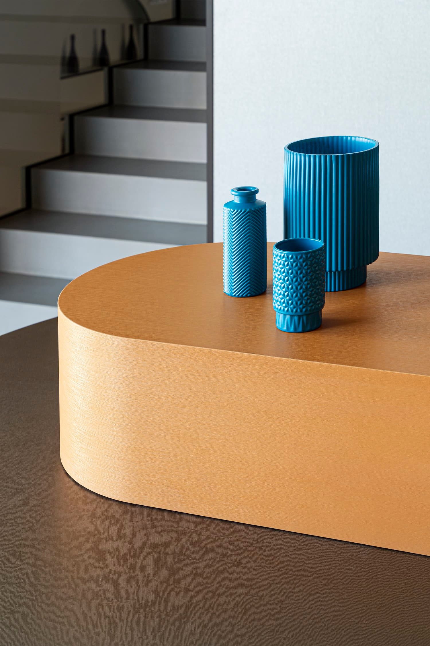 Blue vases on the brushed gold counter of the Disco Bar