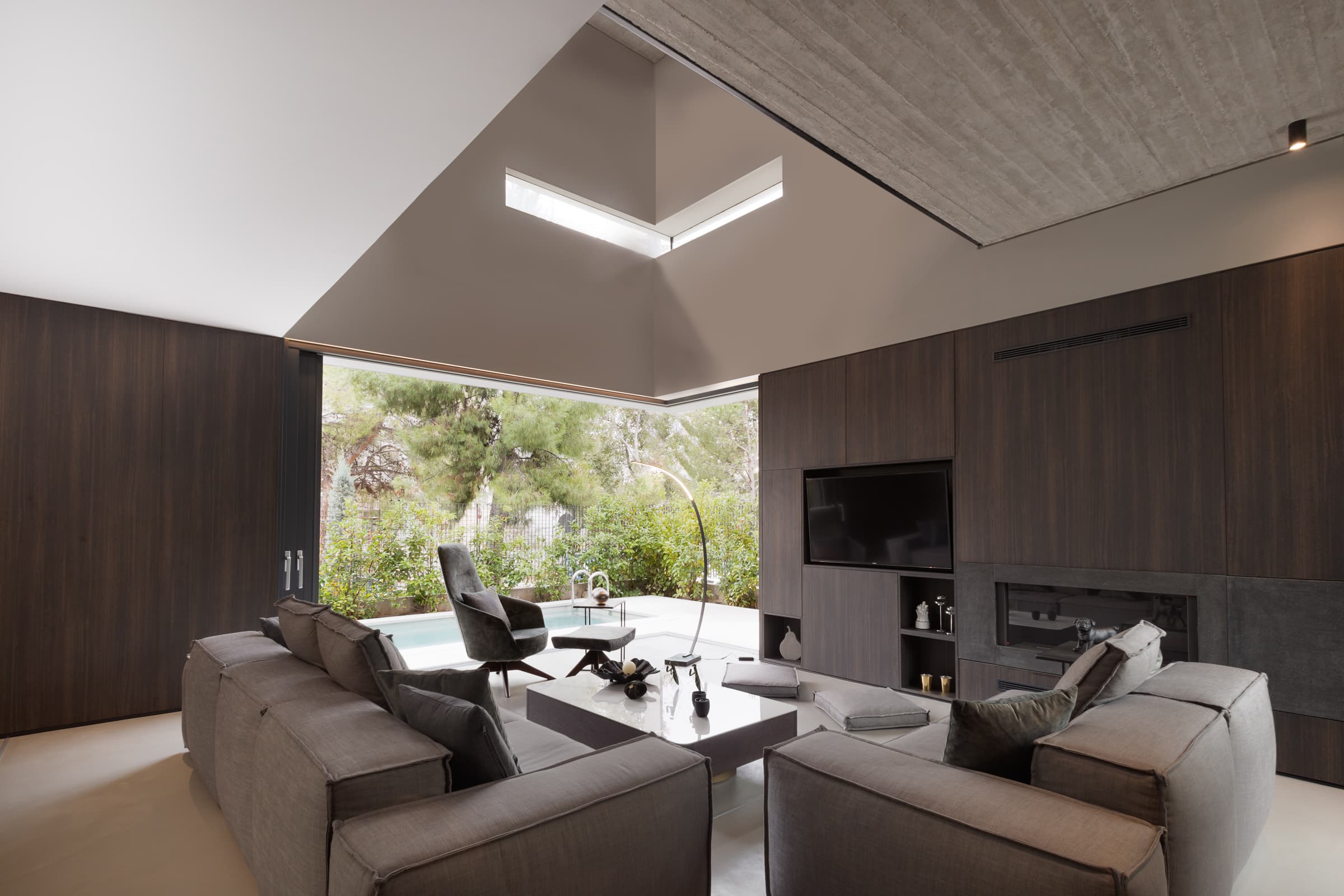 Sculpted ceiling volume over the living room