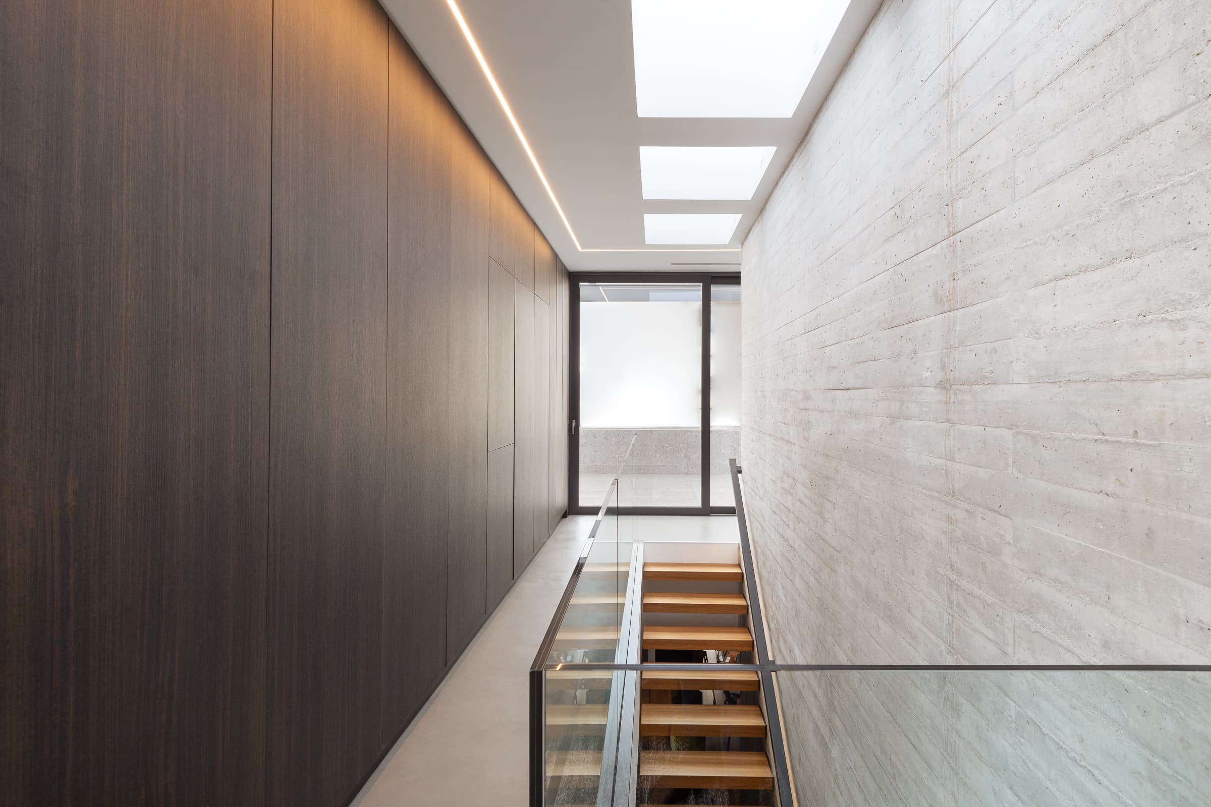 Skylit stair void on the upper floor